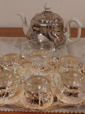 Tea and coffee set like new with silver-plated holders and serving tray