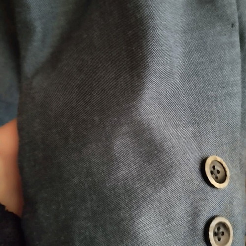 Tailored spring jacket used, hand-stitched