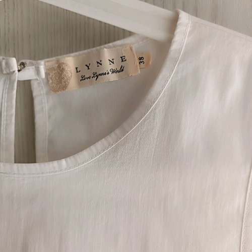 Lynne asymmetric sleeveless top with transparency like new, white