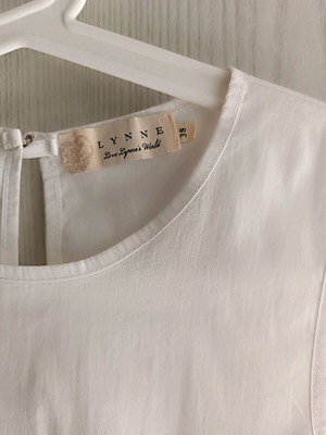 Lynne asymmetric sleeveless top with transparency like new, white