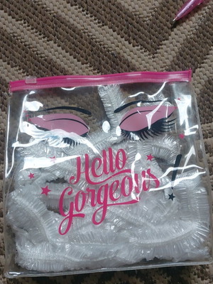 Travel toiletry bag used, pink, with hair protector for bath
