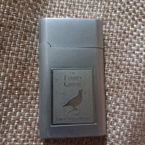 FAMOUS GROUSE collectible lighter used