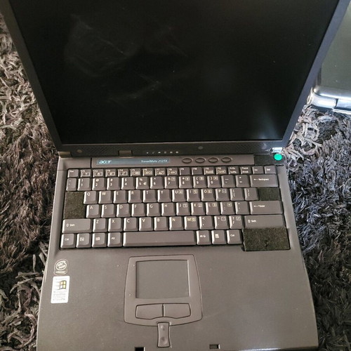 Acer laptop used, powers on without charger