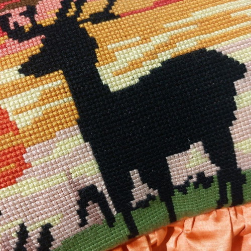 Pillow with handmade cross-stitch design like new