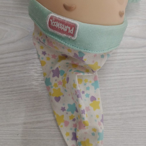 Light-up Huggy toy from the 1990s, fabric stains