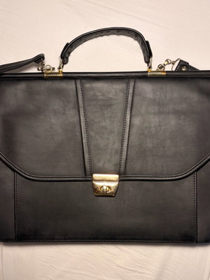 Leather women's briefcase used with gold details