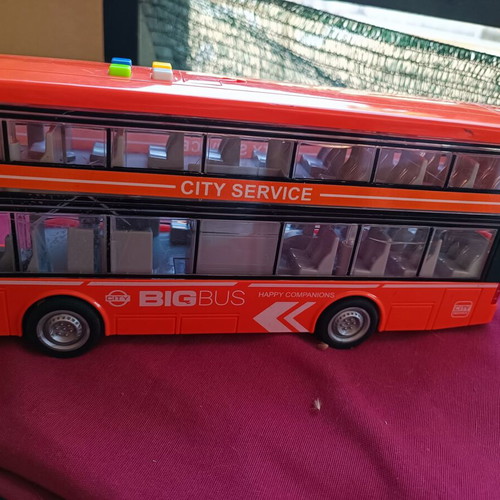 Toy bus used with lights and sounds