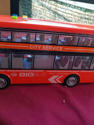 Toy bus used with lights and sounds