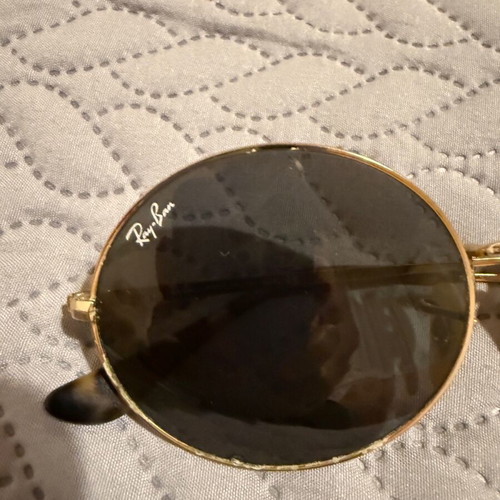 Ray-Ban Oval sunglasses used with gold frame and gray lenses