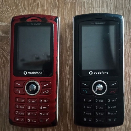 Sharp GX17 phones used, unknown working condition, set of two
