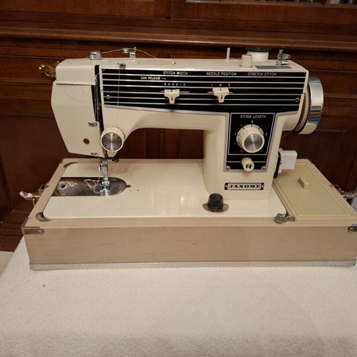 Janone portable sewing machine used with accessories