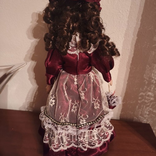 Porcelain doll, decorative, blue or burgundy