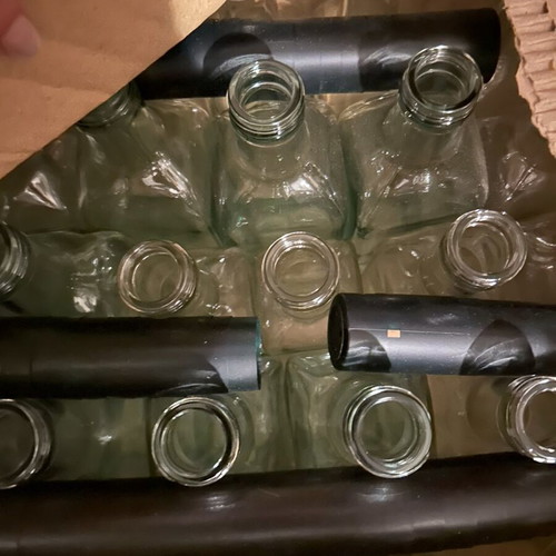 Bottles and jars new with lids and hand bottling system