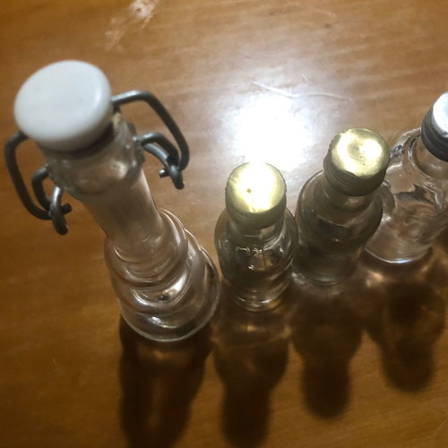 Glass miniature bottles used, pack of 7, vintage spirit collection
