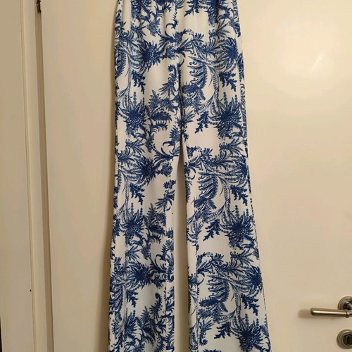 Coocu printed pants like new, slim fit with elastic waist