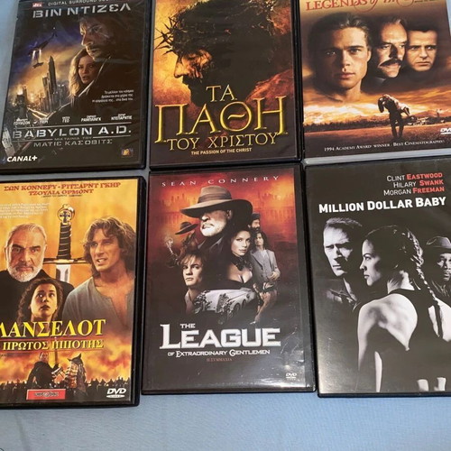 6 DVDs with movies starring Mel Gibson, Brad Pitt, Connery, Eastwood, Richard Gere, Vin Diesel