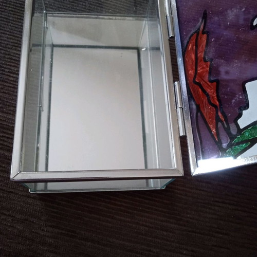 Stained glass jewelry box used with embossed colors and mirror base