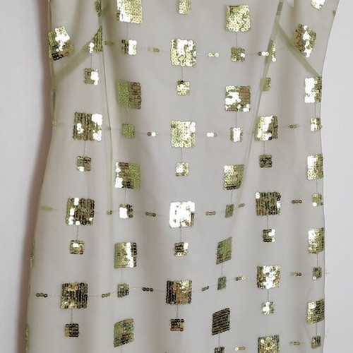 Dress green light with sequins size 48 like new