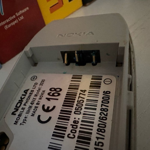 Nokia 3330 used, battery frame oxidation, gray