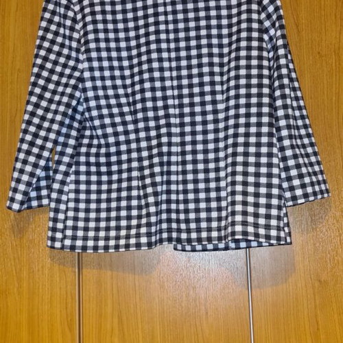 Checkers jacket with shoulder pads and elbow-length sleeves medium used