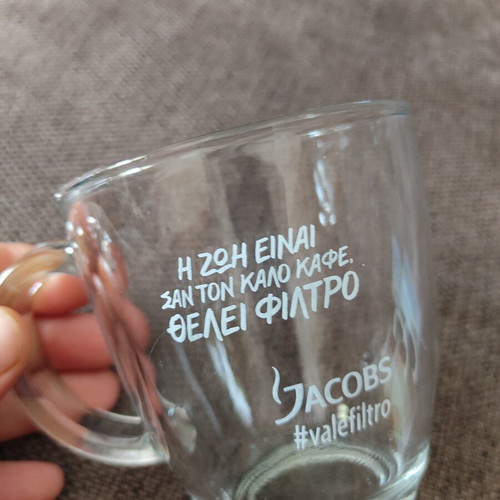 Jacobs glass mug new, heat resistant with printed message