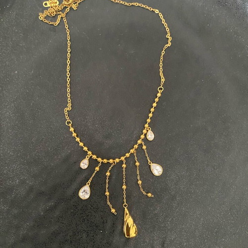 Steel necklace with rhinestones gold color new