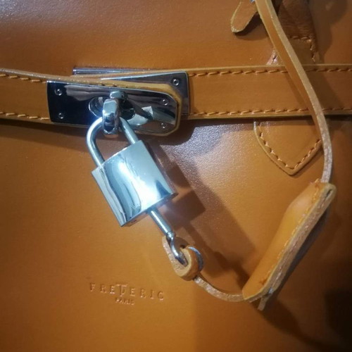 Frederic T Paris leather shoulder bag with padlock used orange