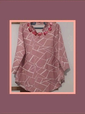 Pink blouse with unique pattern