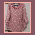 Pink blouse with unique pattern