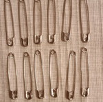 Set of 12 stainless steel safety pins, 6 cm each