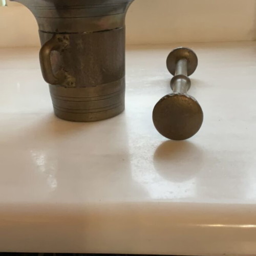 Copper mortar and pestle used, heavy and large