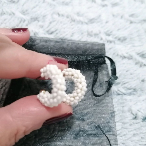 Earrings with white beads used