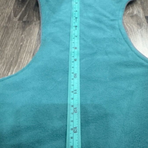 Waterproof dog jacket like new with fleece lining in petrol color