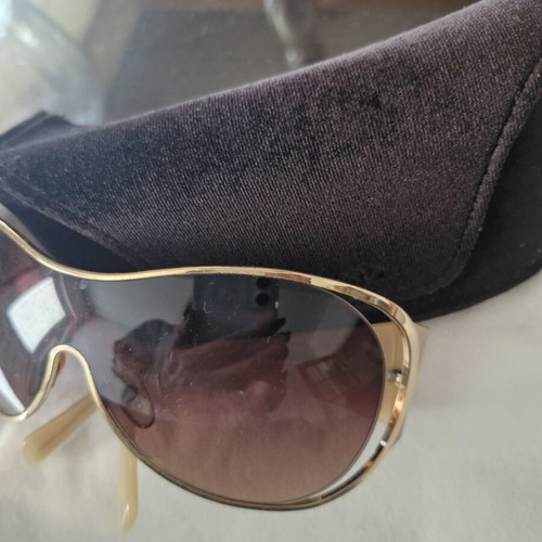 Givenchy sunglasses used, gold color