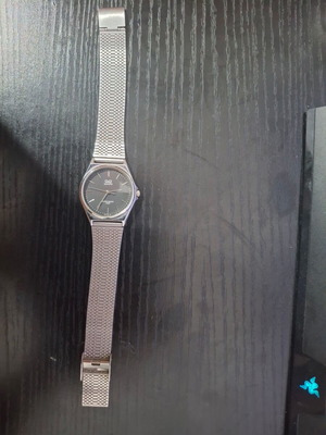 Q&Q Quartz men's watch used, silver with black dial
