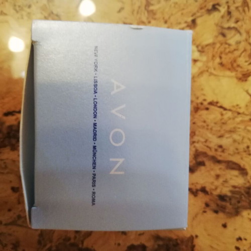 Avon silver hanging earrings with crystals, new in original box