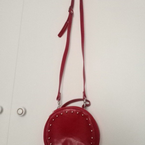 Leather crossbody bag red used with studs and shoulder strap