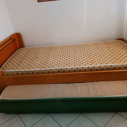 Single bed with used sliding bed and metal frame