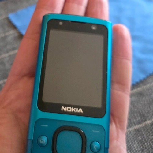 Nokia 6700 Slide used, turquoise, classic slider phone