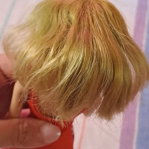 Barbie doll used with modern dress and painted cut hair