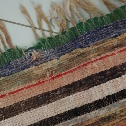 Kilim runner rug used with wear at fringes