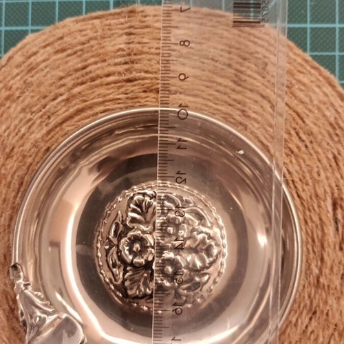 Vintage silver-plated ashtray with floral decorative motif like new