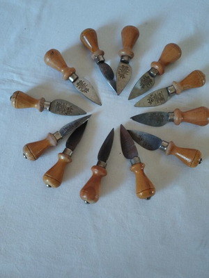 Vintage cheese knives set of 12 like new