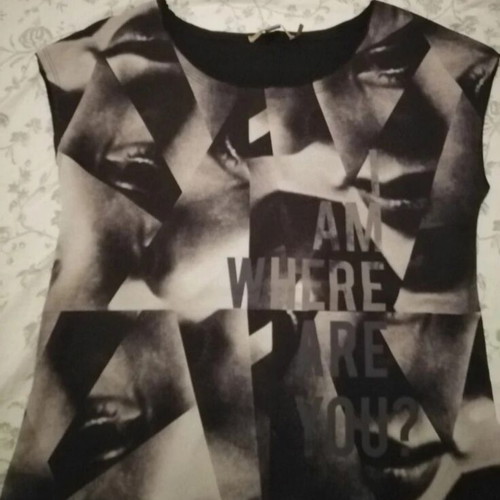 Attrattivo women's asymmetrical blouse M, like new, black and white
