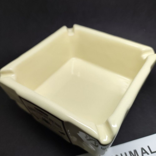 Karelias Ceramic Ashtray like new with classic gold tones