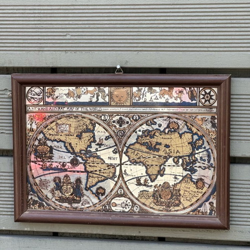 Decorative mirror with antique world map used, wooden frame