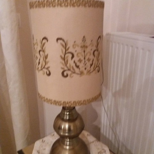 Bronze lamp used with handmade embroidery shade