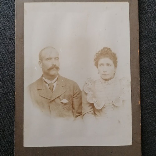 Photograph on thick cardboard used, with damages