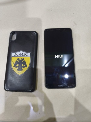 Xiaomi Redmi 7A smartphone with case