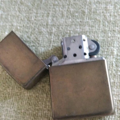 Zippo lighter collectible used, bronze color